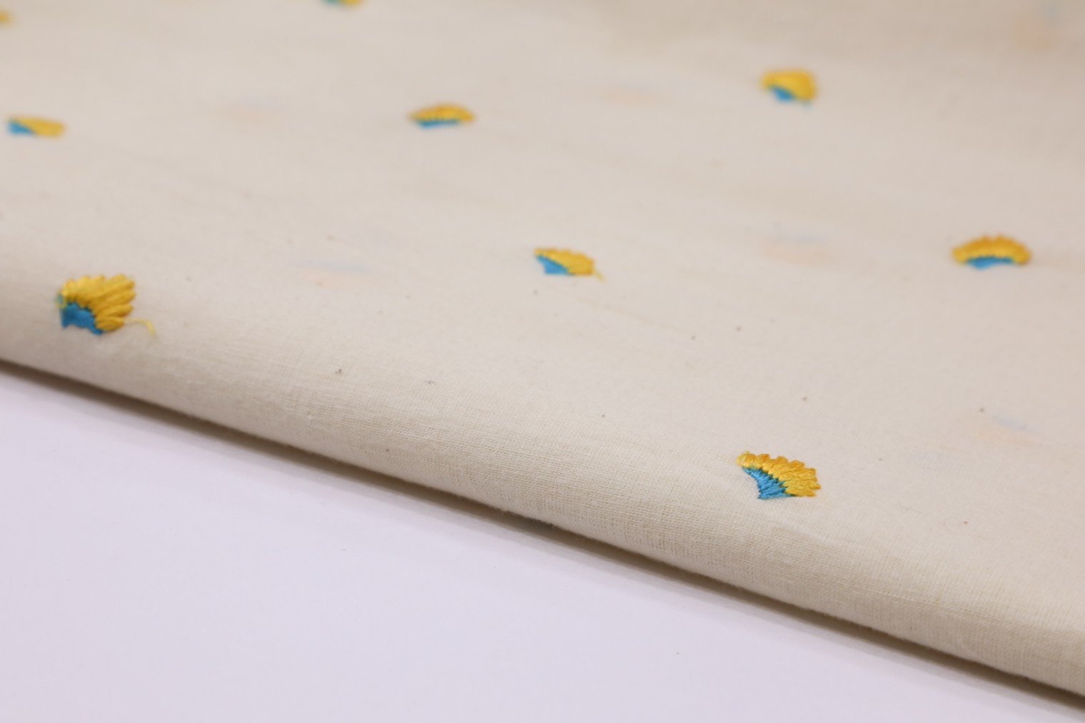 OFFWHITE COLOR YELLOW THREAD WORK MOTIF EMBROIDERY COTTON FABRIC 2452