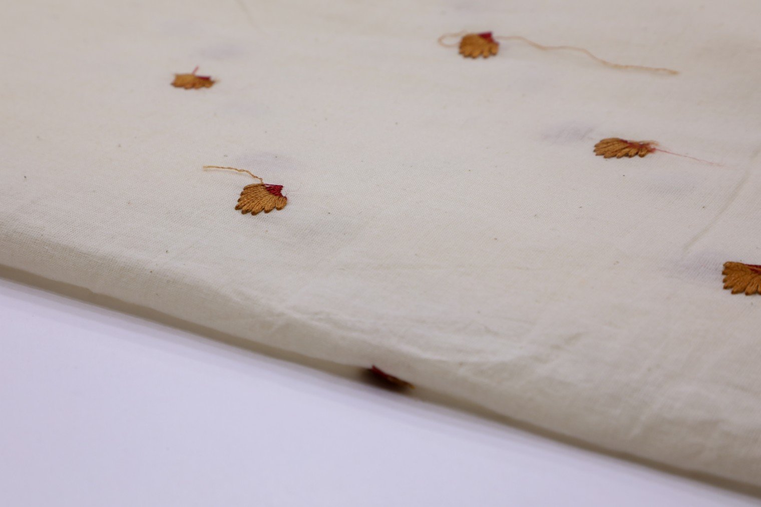 OFFWHITE COLOR TURMERIC YELLOW THREAD MOTIF COTTON FABRIC 2490