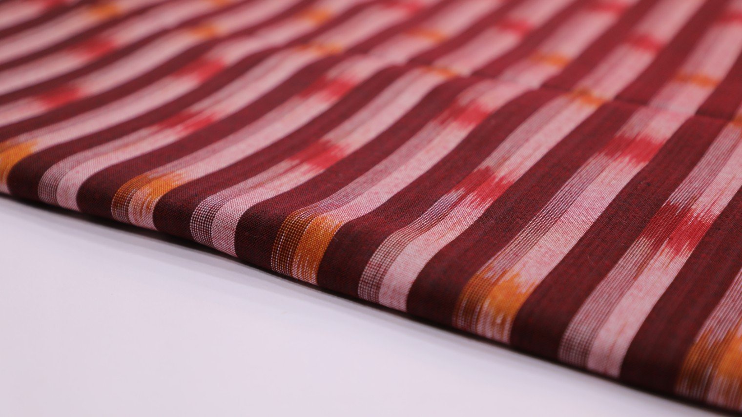 CADILLAC MAROON COLOR COTTON IKAT GEOMETRIC WEAVE MOTIF STRIPED FABRIC - 4070