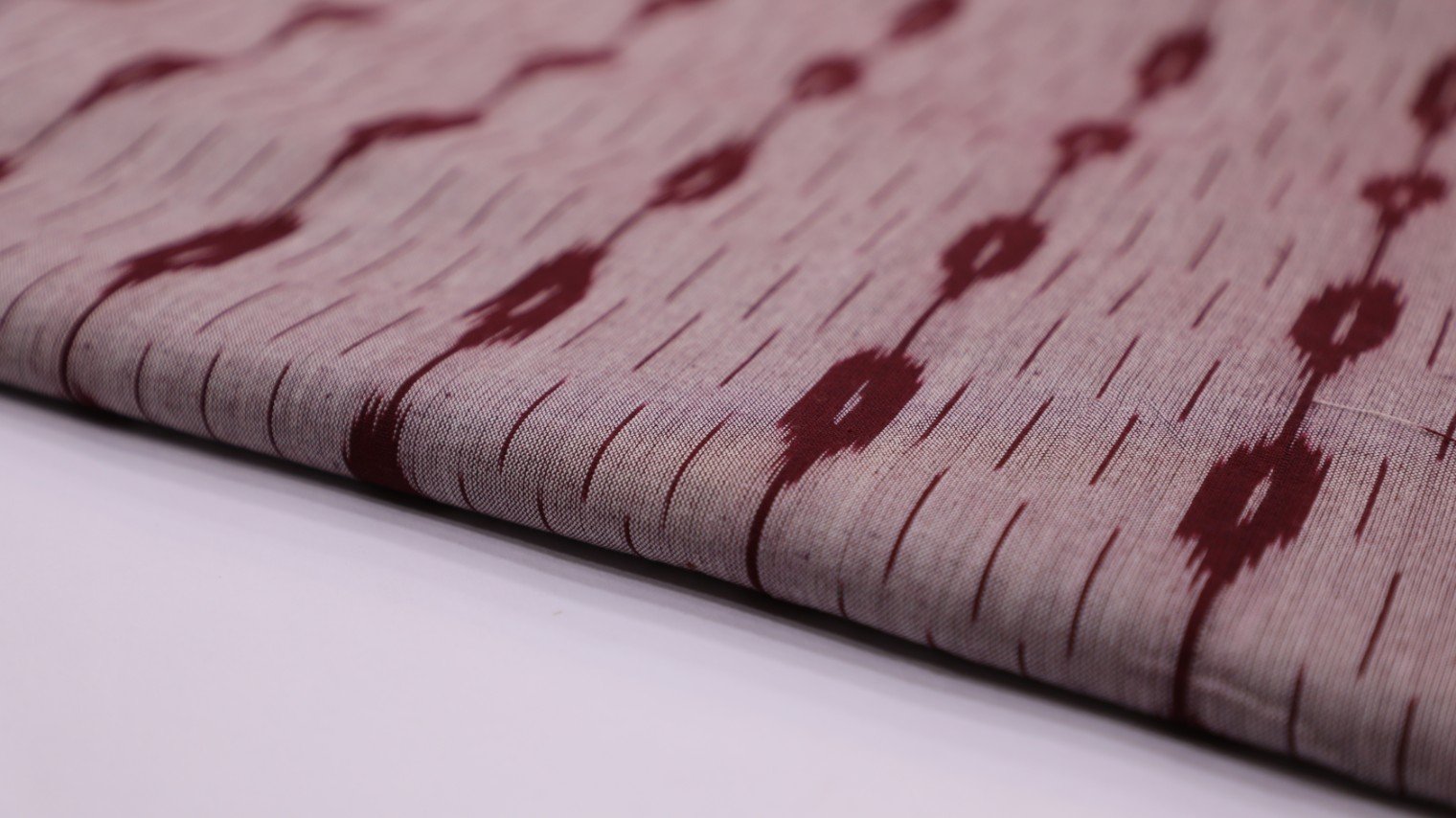 SWAN PINK COLOR COTTON IKAT MAROON GEOMETRIC ABSTRACT PATTERN FABRIC - 4083