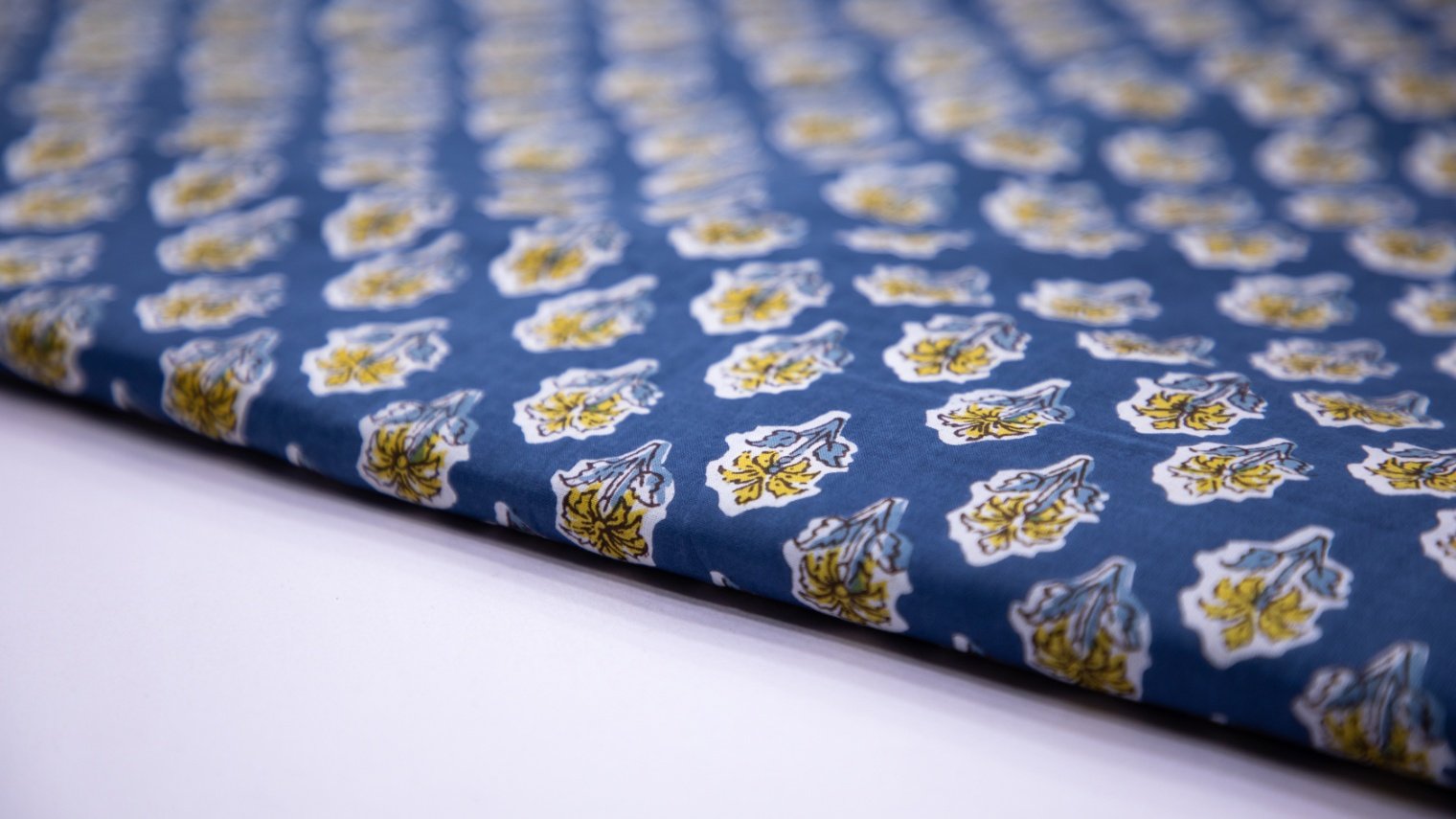 INDIGO BLUE COLOR COTTON SCREEN PRINT JAIPURI YELLOW FLORAL MOTIF FABRIC - 5642