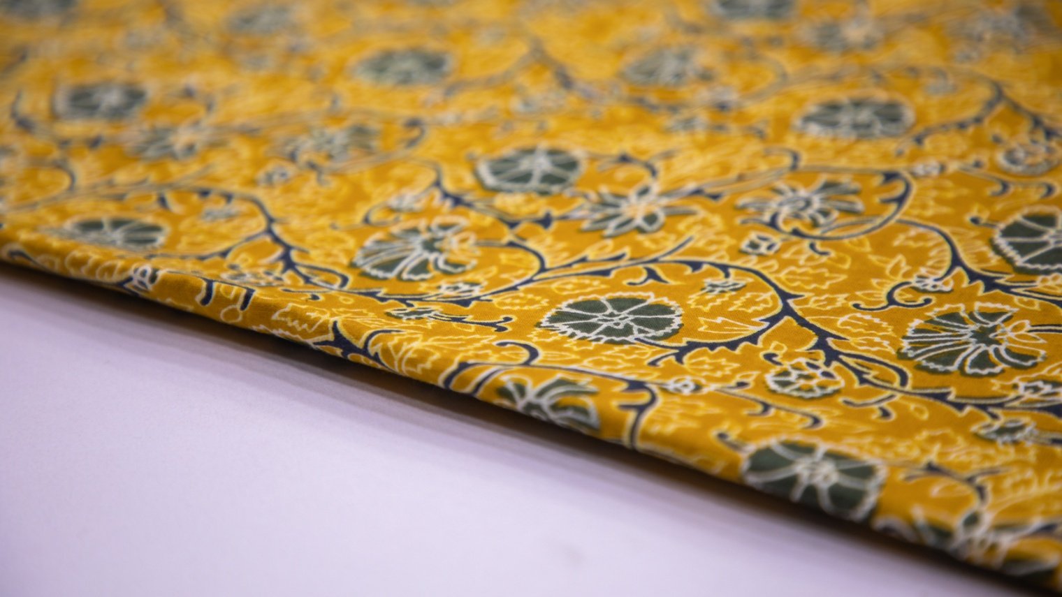 TURMERIC YELLOW COLOR COTTON JAIPURI GREEN ALLOVER PATTERN SCREEN PRINT FABRIC - 5810