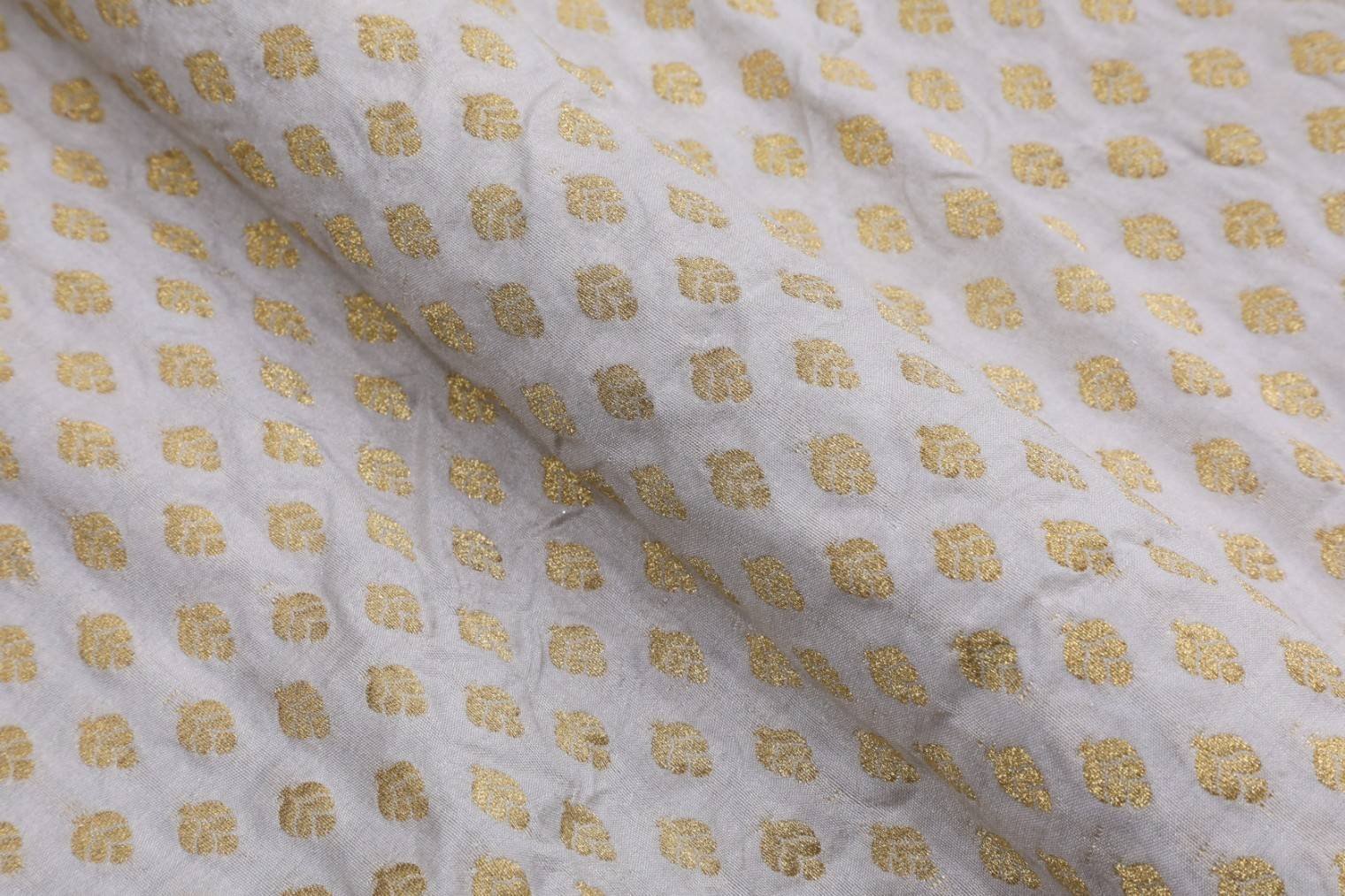 DIABLE CREAM COLOR BANARASI CHANDERI METALIC ANMOL GOLD LEHERIYA PATTERN PORY BROCADE FABRIC 11123